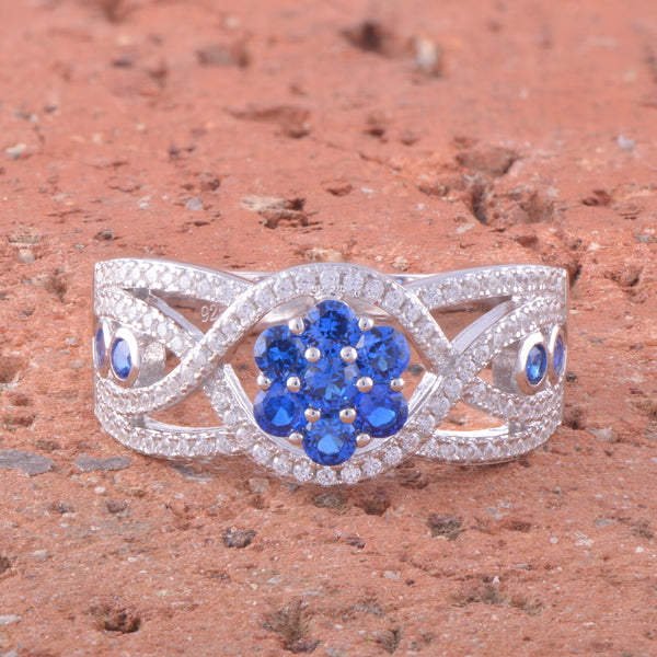 White Gold Over Sterling Silver Simulated Blue Sapphire Flower Ring