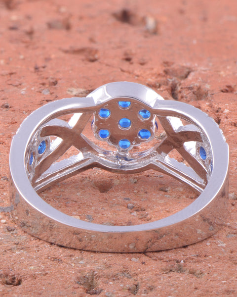 White Gold Over Sterling Silver Simulated Blue Sapphire Flower Ring